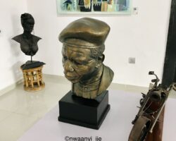 Metal bust of China Achebe