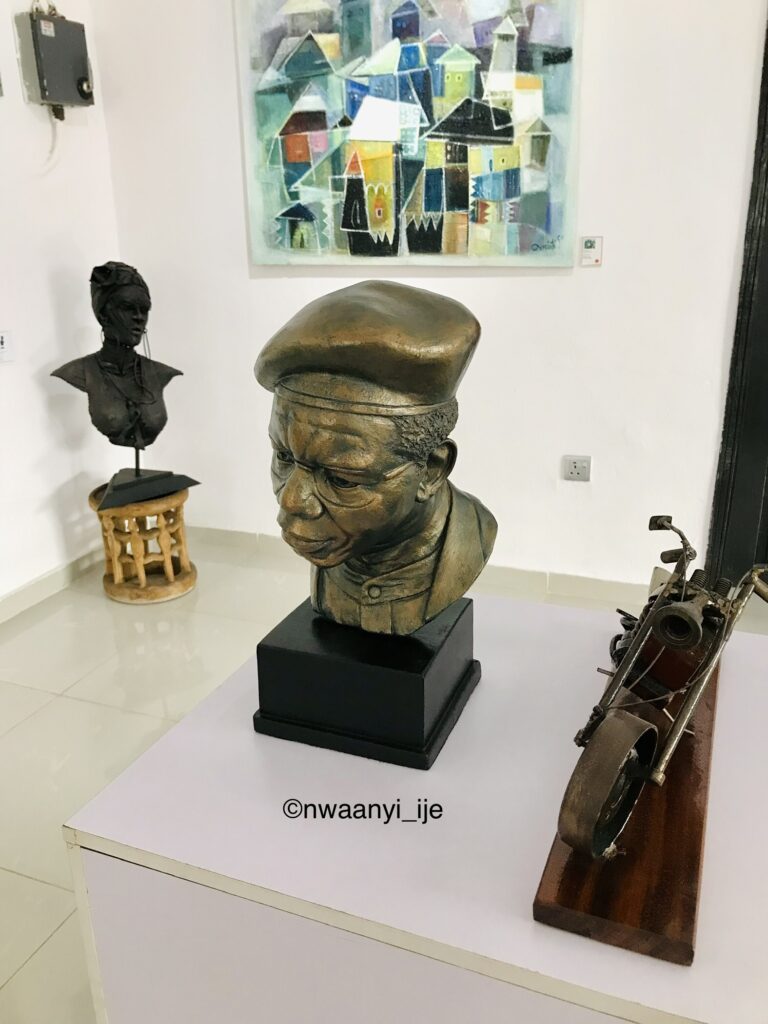 Metal bust of China Achebe
