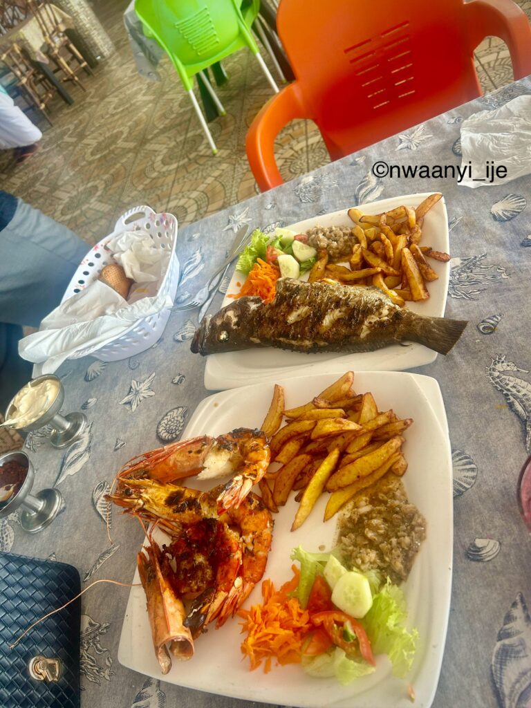Griled grouper fish, tiger prawns and fries